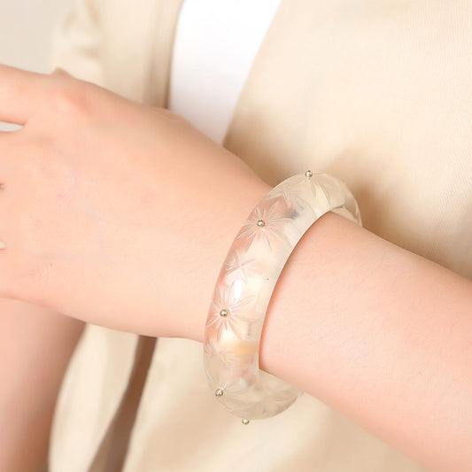 douglaspoon hand carved resin bangle in vintage clear
