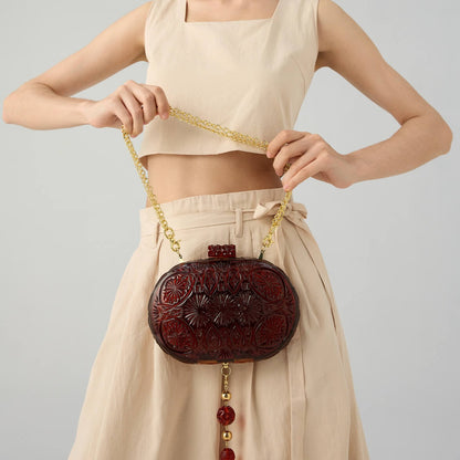 Hand Carved Oval Clutch Amber