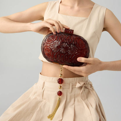 Hand Carved Oval Clutch Amber
